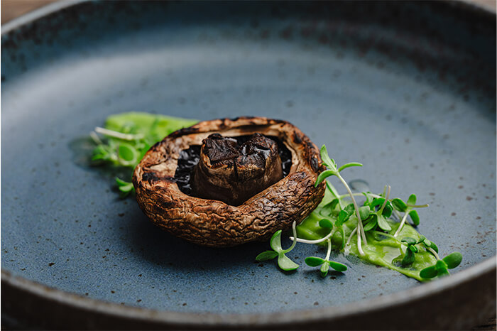 Grilled semi-dried miso-pickled mushroom with Green pea sauce